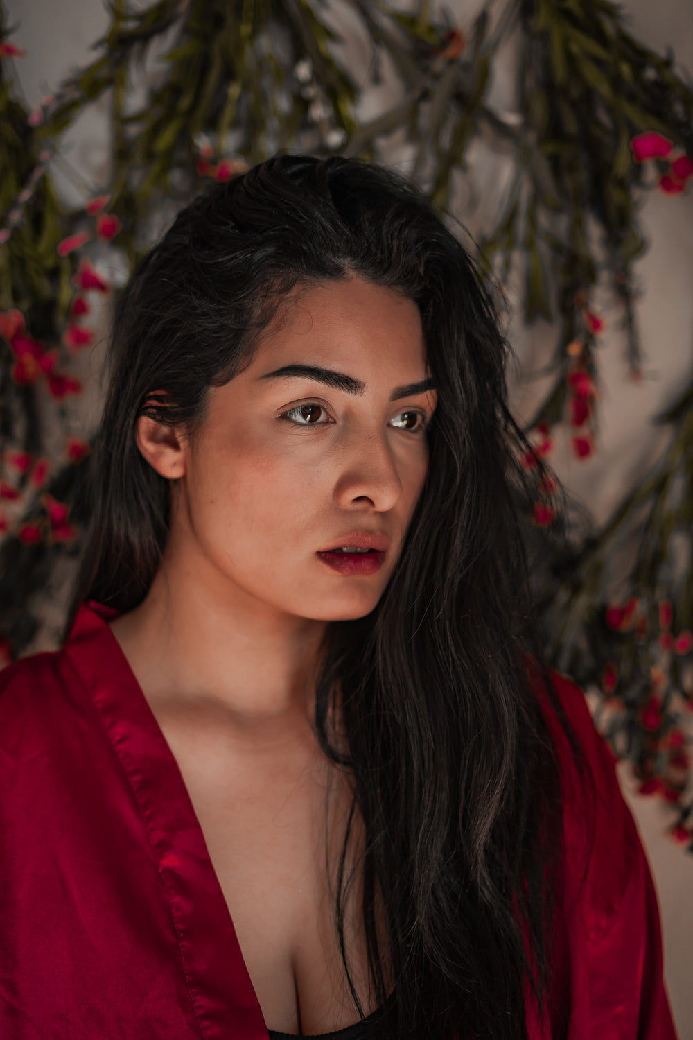 indian woman with long healthy hair & red lipstick