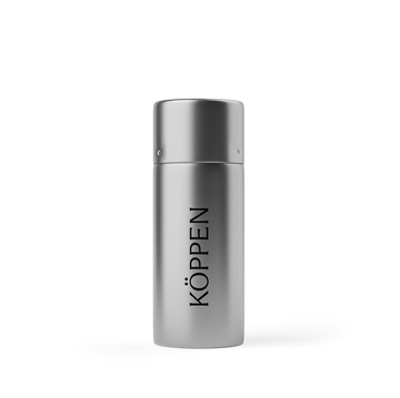 Silver floss container with 'Köppen' branding on a white background