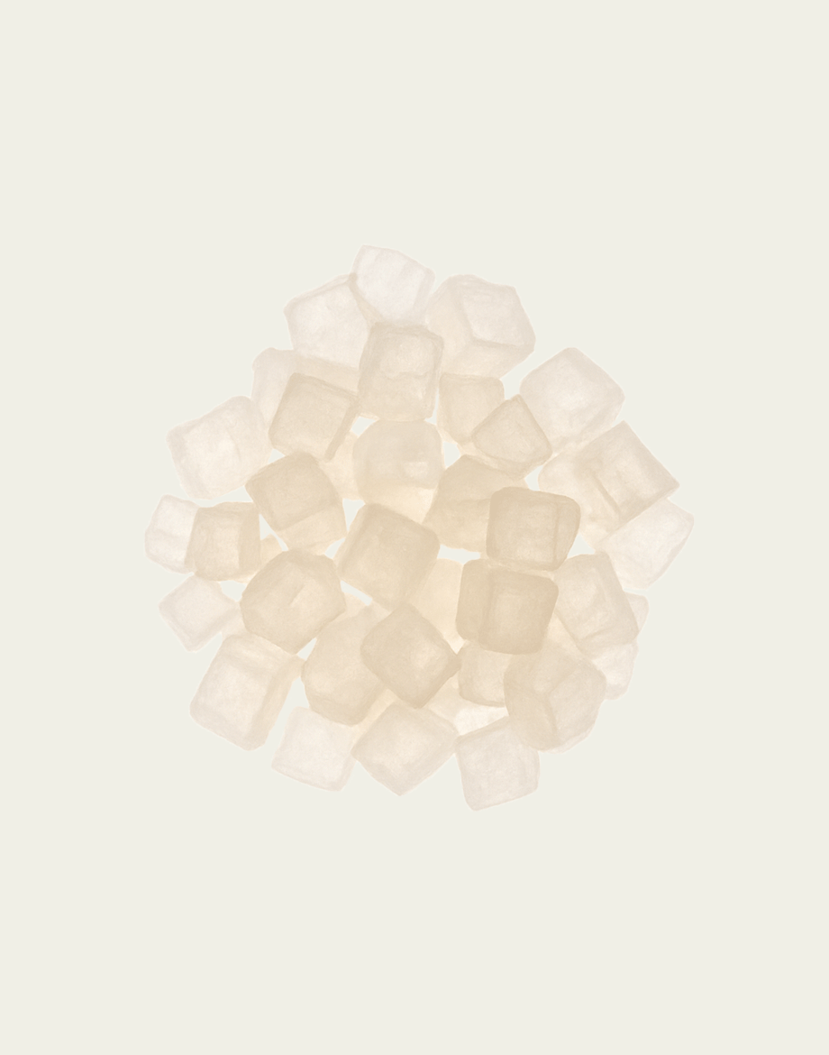 Group of xylitol cubes on a light beige background