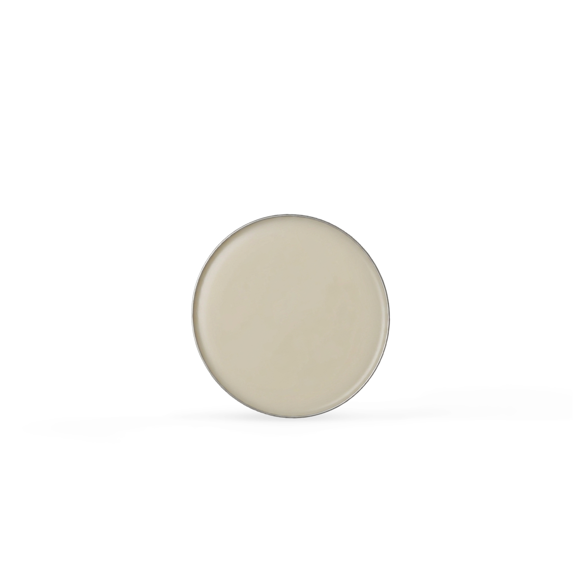 Round aluminum tin with beige lip balm filling on a white background