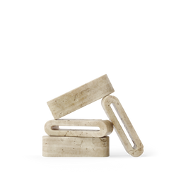Three beige travertine rectangular objects stacked on a white background