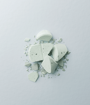 Crushed mint on a grey background