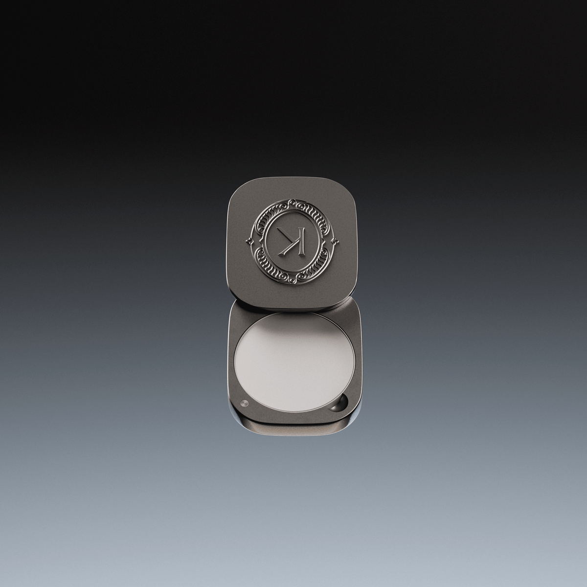 Grey lip balm compact with K brand logo on a gradient background