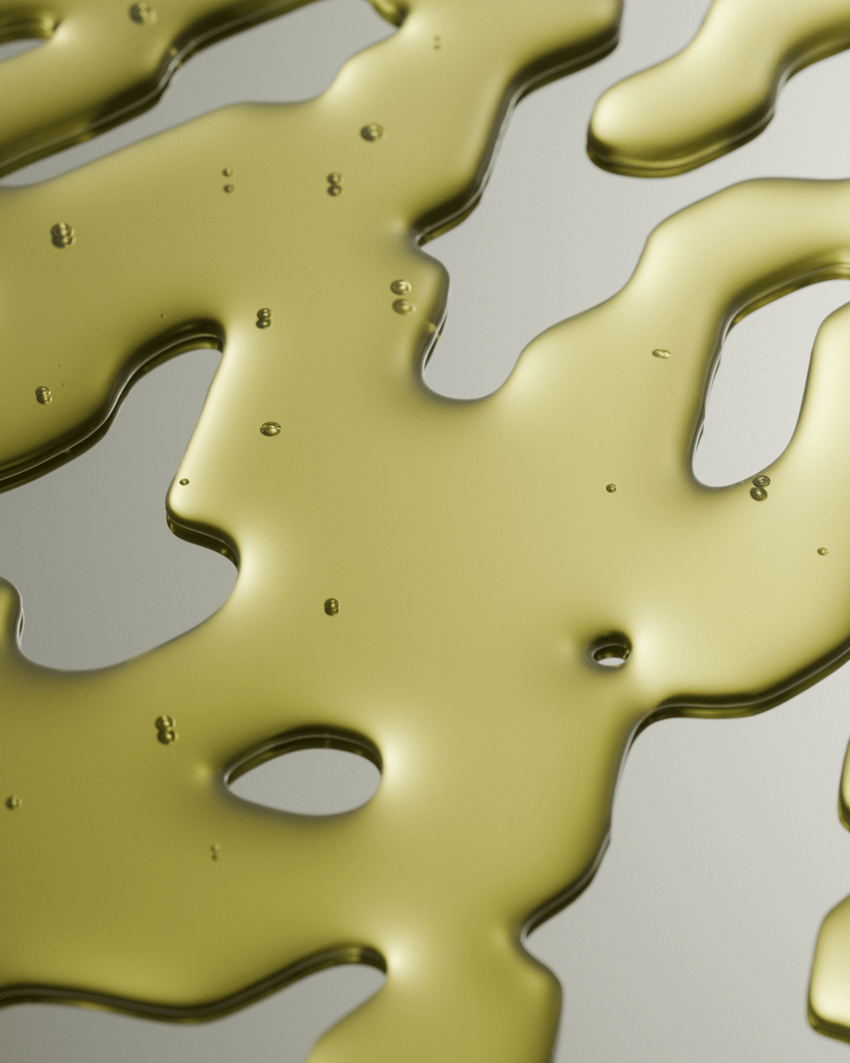 Close-up of gold liquid on a gray background