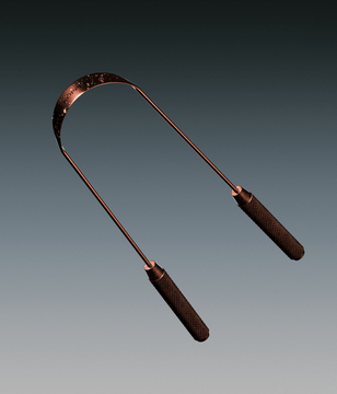 Copper tongue scraper on light grey background